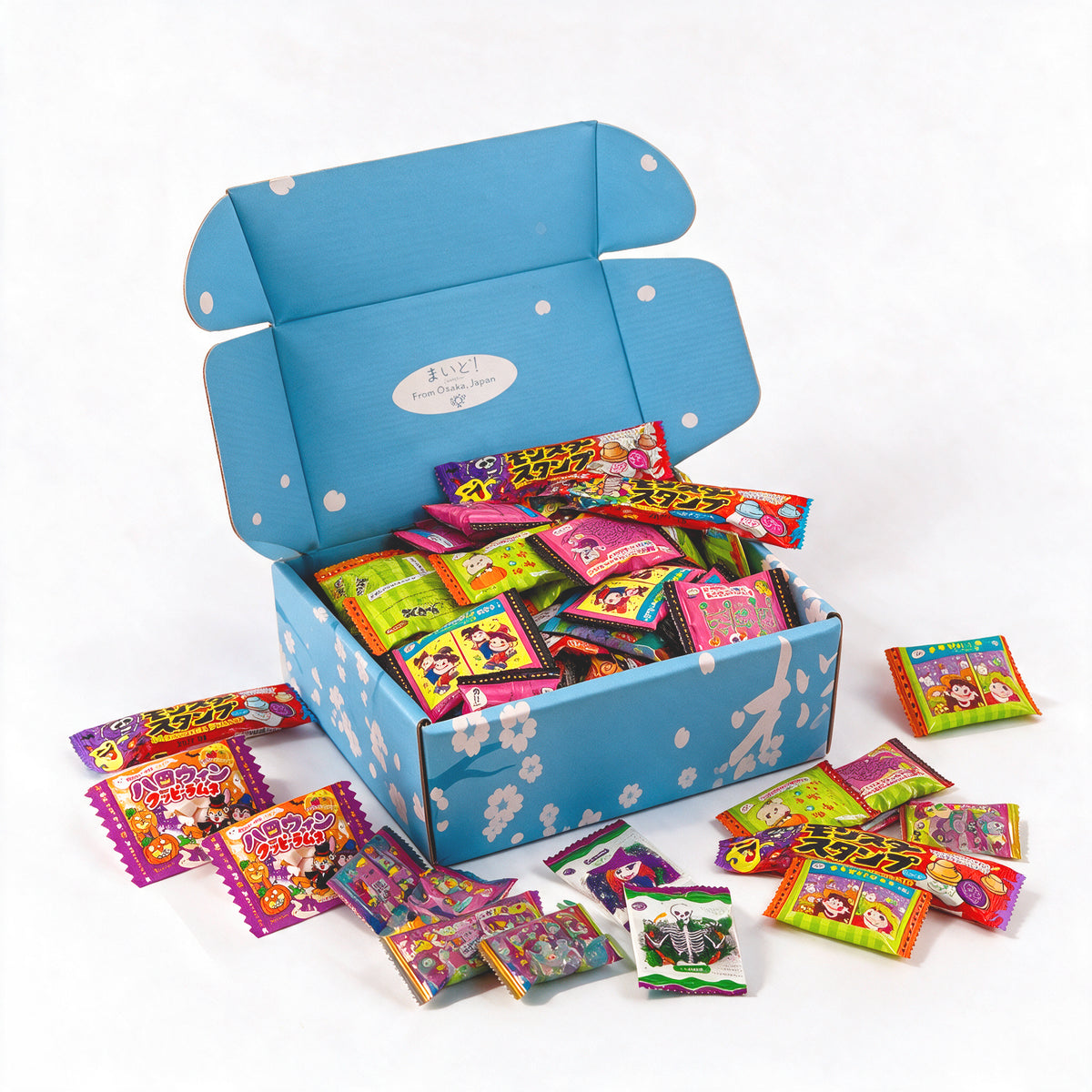 Open Sakura Box Halloween candy set with Japanese treats displayed on a white background