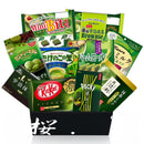 Open black Sakura Box filled with 10 full-size Japanese matcha snacks