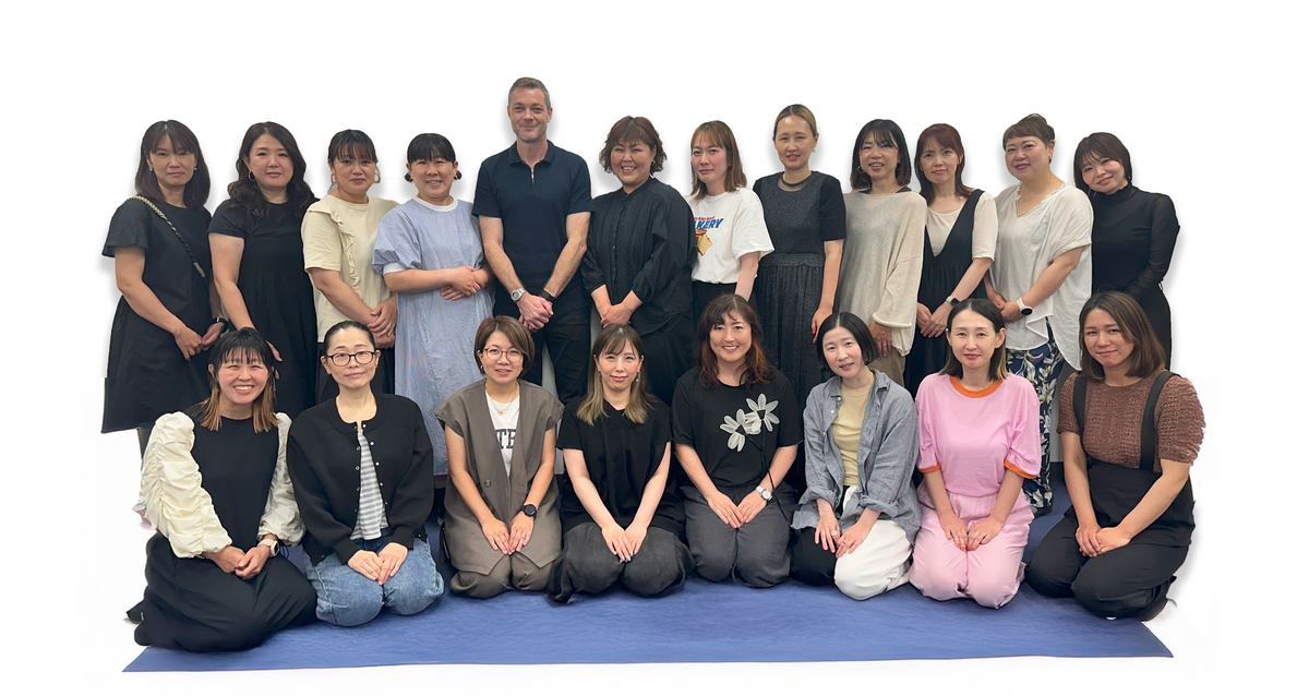The Sakura Box team packing snack boxes in Osaka