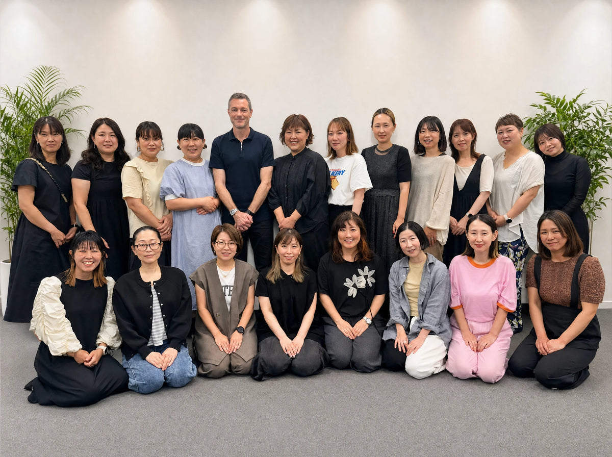 The Sakura Box team packing snack boxes in Osaka